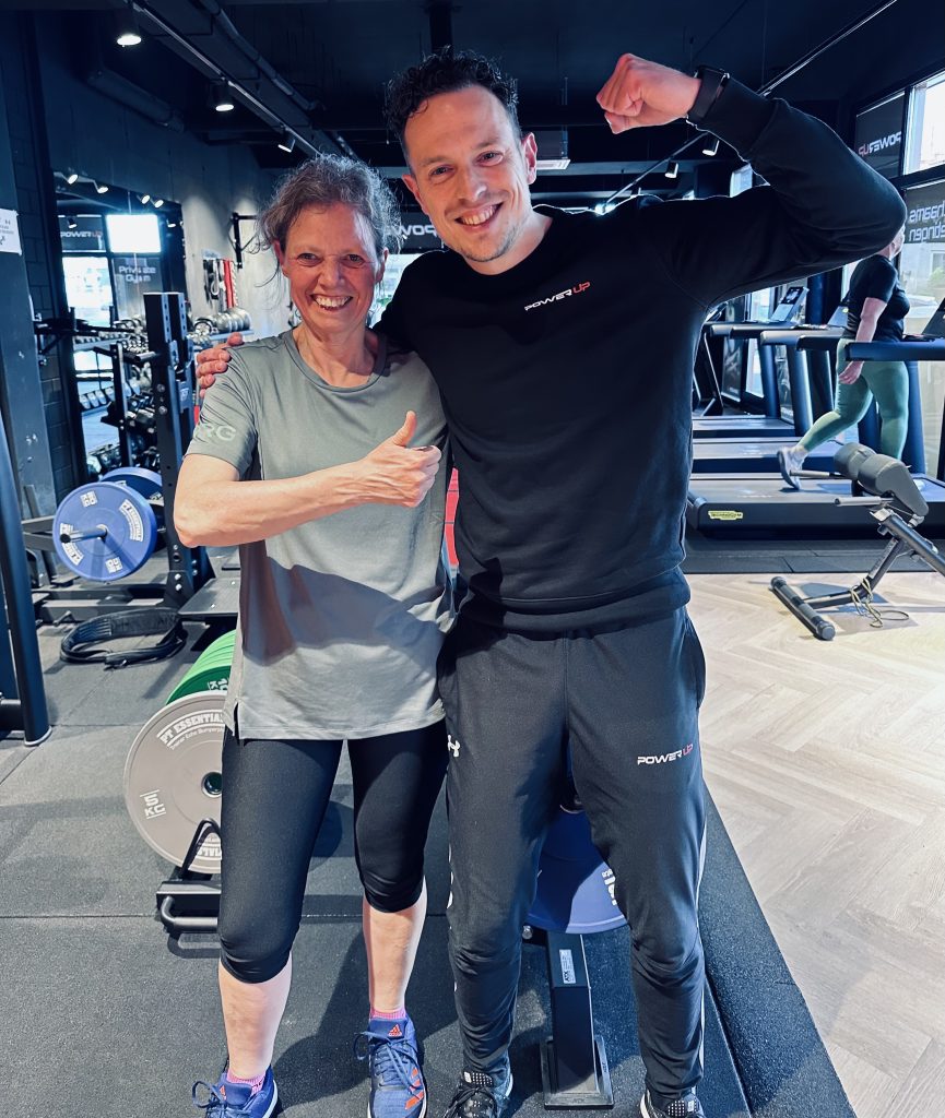personal trainer with happy customer